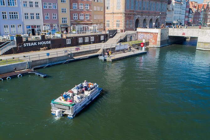 Cruises on the Motlawa River by a luxury catamaran - Gdańsk from the water side - Where you meet: Green Bridge is your easy start line