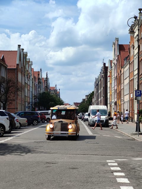 Gdansk: City Sightseeing Tour Eco Electric Buggy Golf Cart ! - Market Hall, Mill, Station: The City Beyond the Postcard