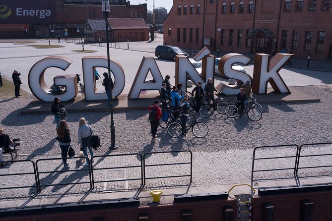 Gdansk Highlights Bicycle Tour - Shipyard time: where communist-era power shows up