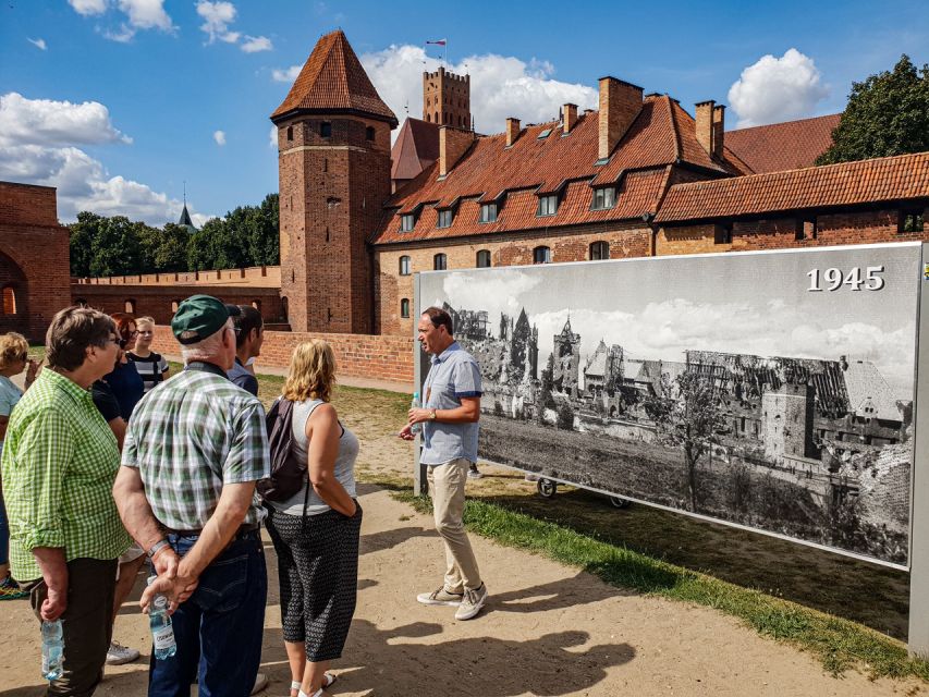 Gdansk: Malbork Castle & Westerplatte Tour with Local Lunch - Inside Malbork: audio guide time, plus medieval real talk
