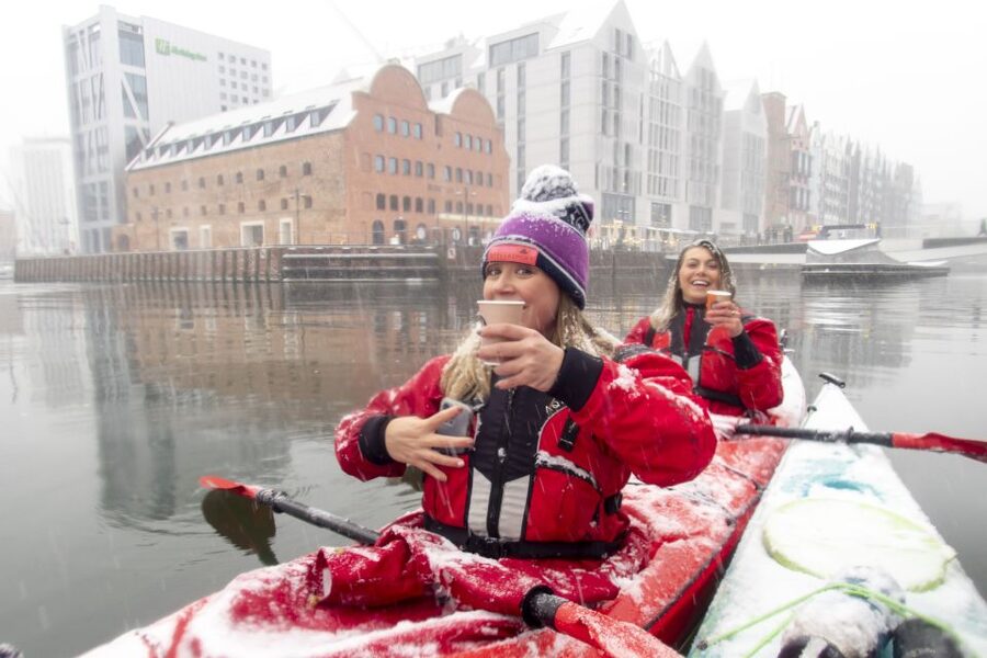 Gdansk: Winter Kayaking Tour - Sights from the Motława: shipyard cranes, churches, and apartment blocks