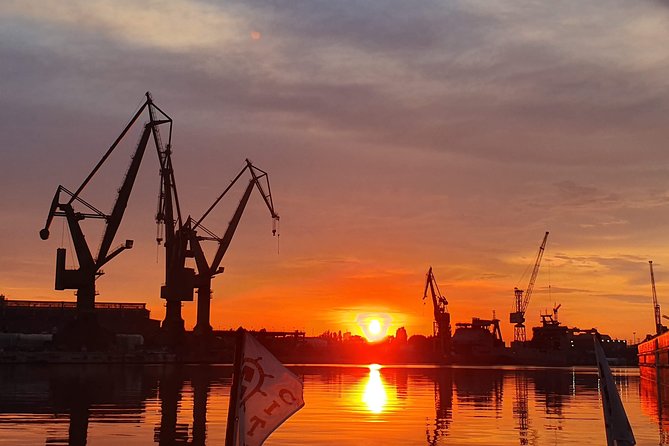 Sunset on the Shipyard and Old Town Evening Cruise - Motława River Embankment: Swan Tower, Water Gates, and Old Town Gates