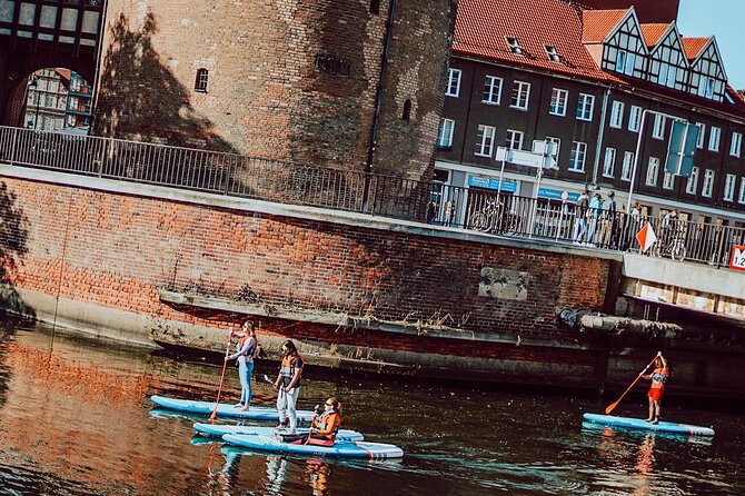 SUP Private Tour in Motlawa River - Wartka Bridge to Wyspa Olowianka: moving between islands and stories